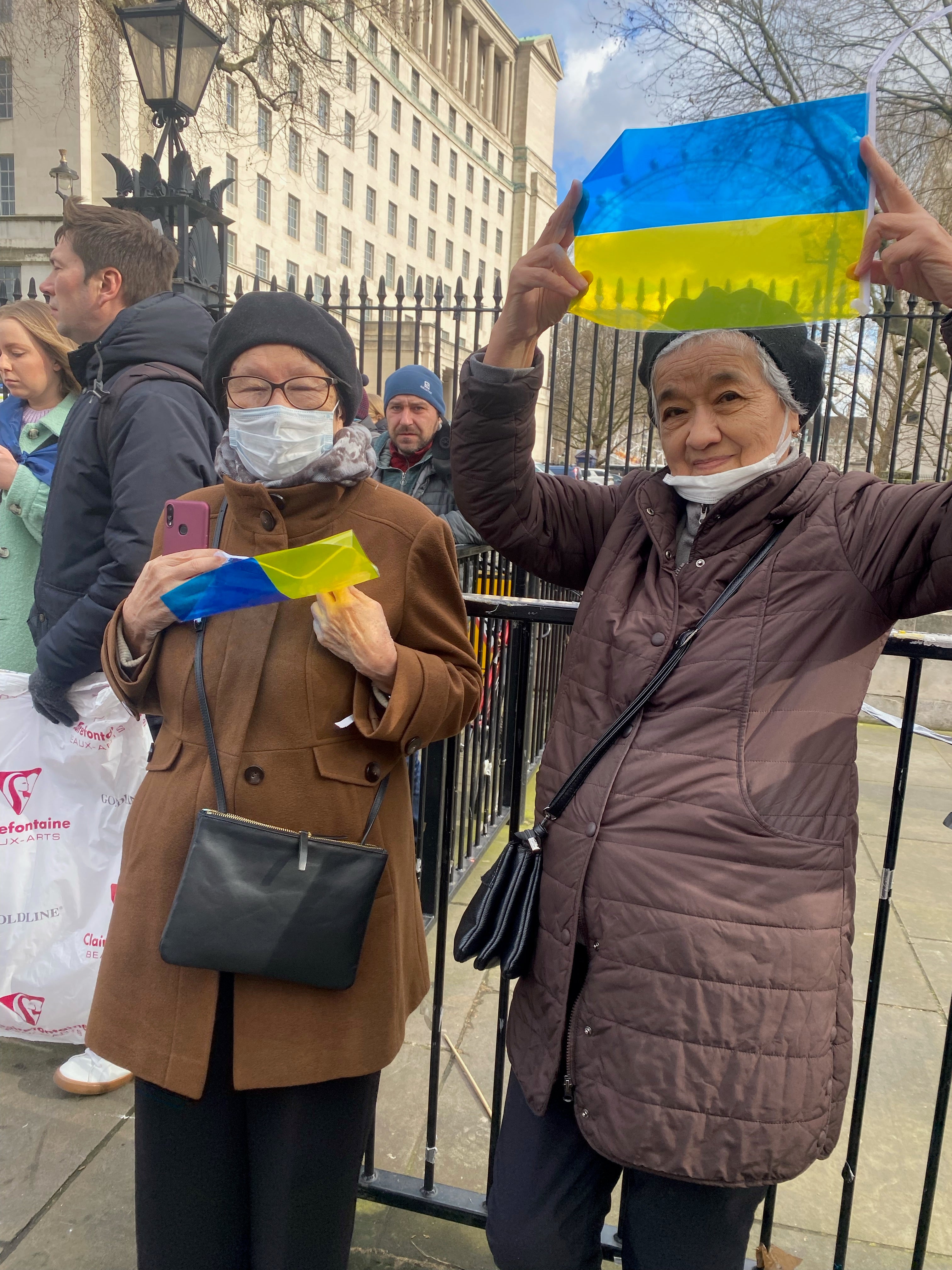 Two women from Kyrgyzstan show their solidarity for Ukraine at the Downing Street protest