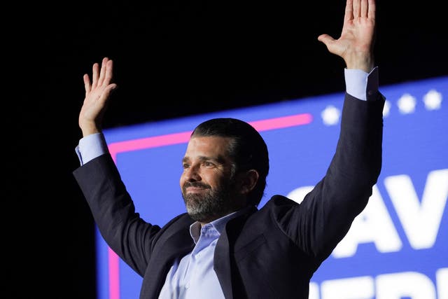 <p>Donald Trump Jr. gestures during a rally where former U.S. President Donald Trump is to speak, in Conroe, Texas, U.S., January 29, 2022. </p>