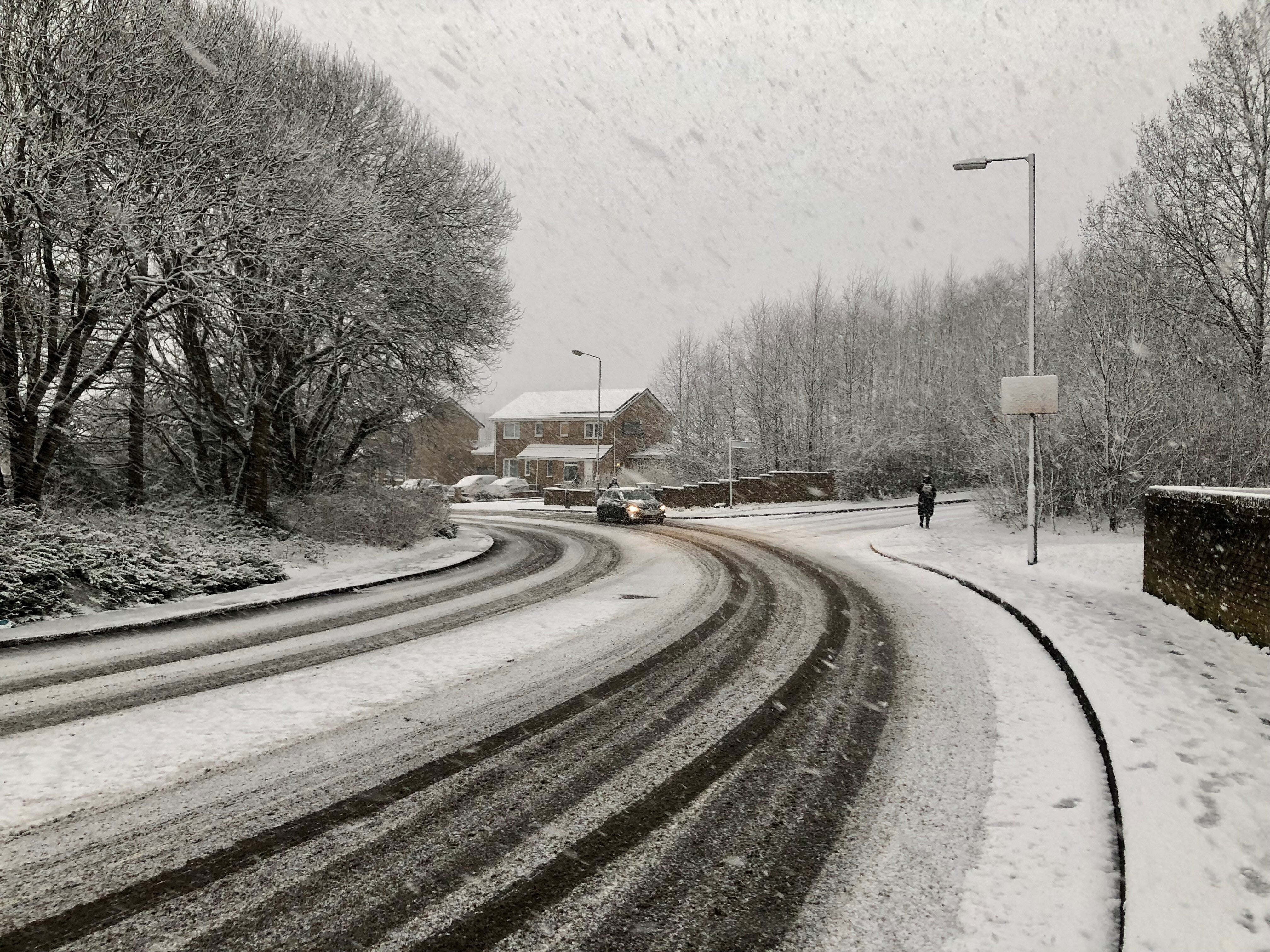 Heavy snow hit Glasgow in Scotland, where schools were forced to shut in some areas on Thursday (Beth Edmonston/PA)