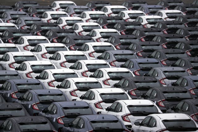 File photo dated 01/01/21 of new cars at the port of Southampton. The number of cars built in the UK has fallen again, says the SMMT (Steve Parsons/PA)