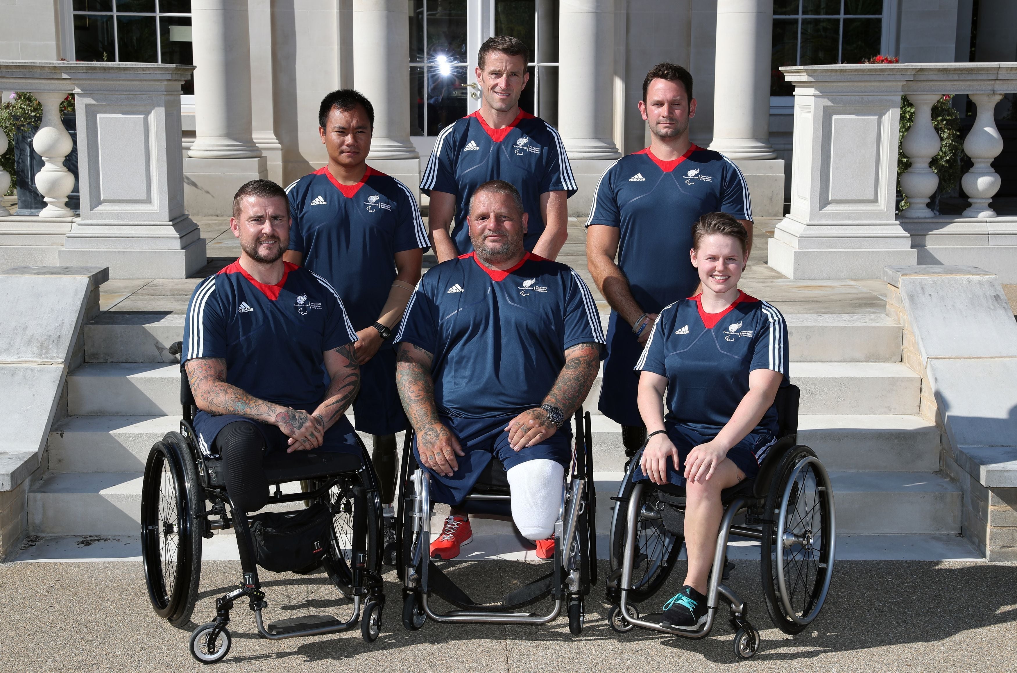 Arnold, top right, met wheelchair rugby Paralympic gold medallist Stuart Robinson, bottom left, through their involvement in the Invictus Games and charity Help for Heroes (Andrew Matthews/PA)