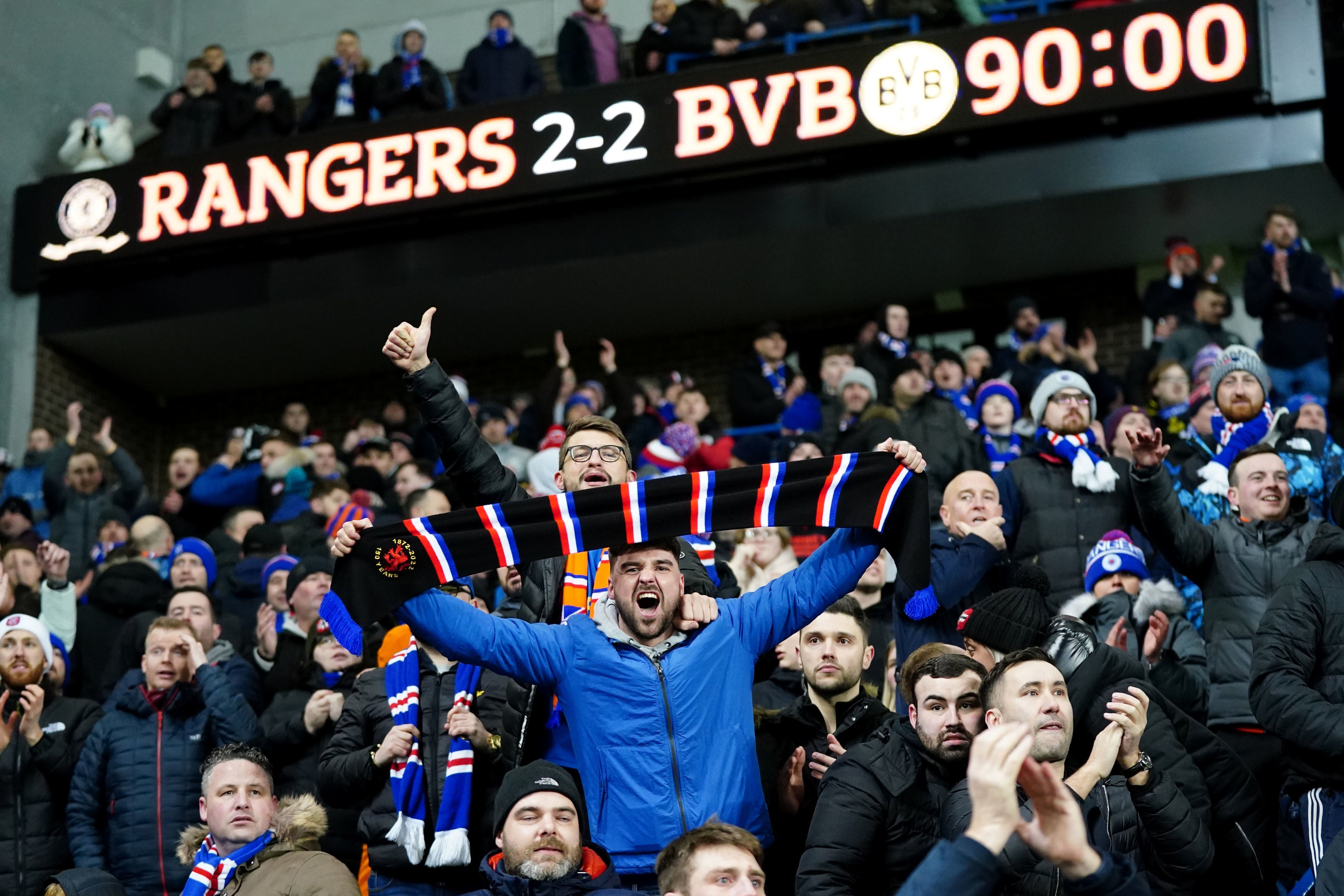 Rangers fans celebrate during their team’s tie against Borussia Dortmund