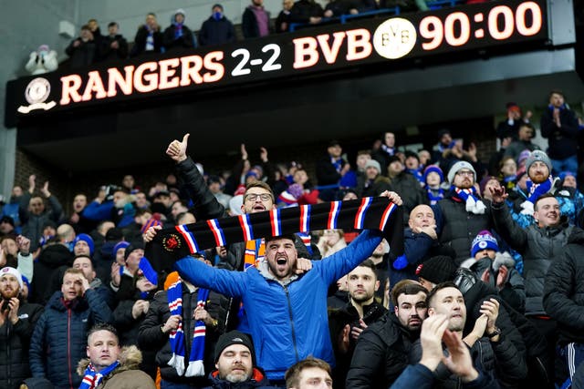 <p>Rangers fans celebrate during their team’s tie against Borussia Dortmund </p>