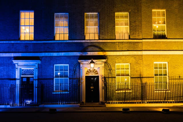 <p>10 Downing Street lit up in blue and yellow in solidarity with Ukraine</p>