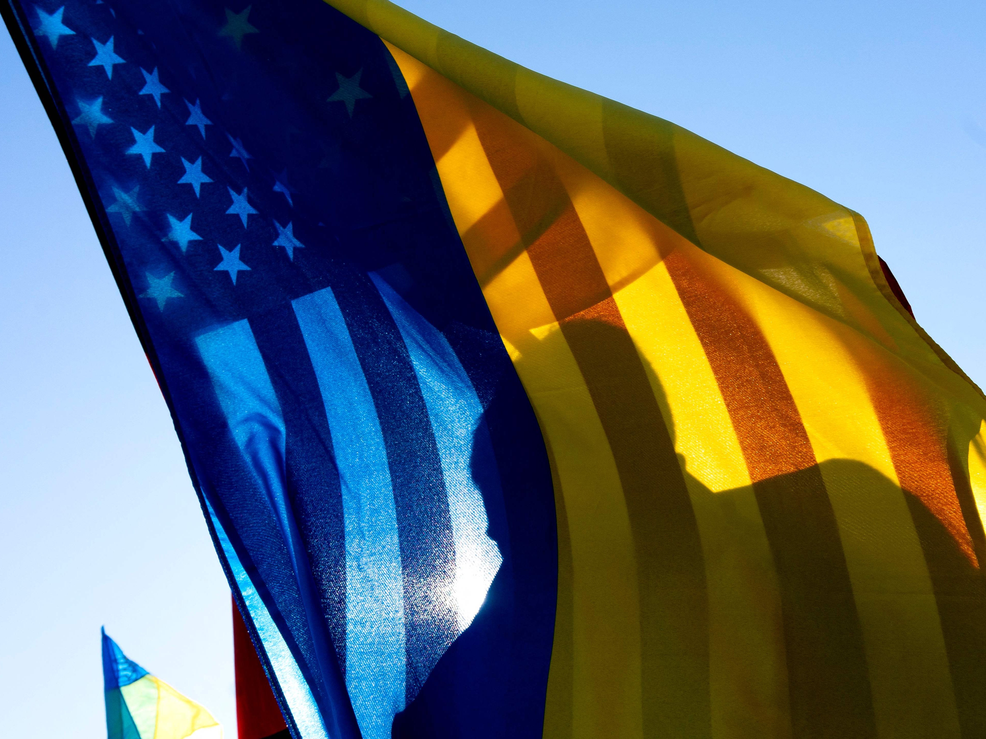 Ukrainian and American flags were flown on Thursday at a solidarity event in Washington DC