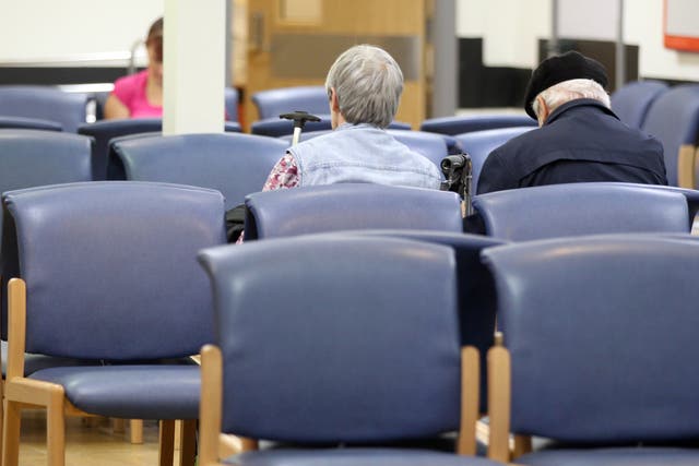 Patients in a hospital waiting room (Lynne Cameron/PA)