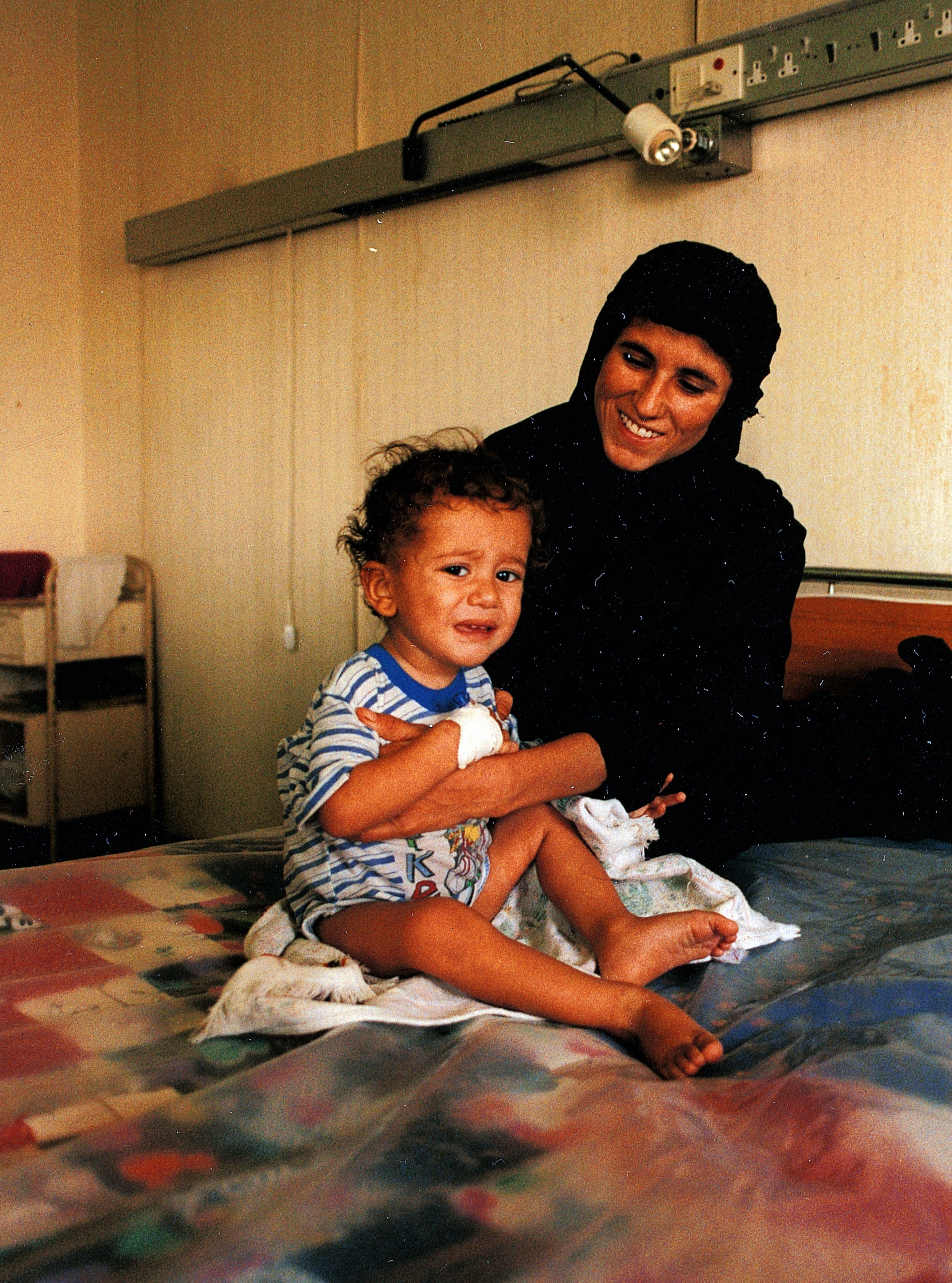 Youssef Qassem, aged two, in a Basra hospital in 1998, on the point of death from leukaemia