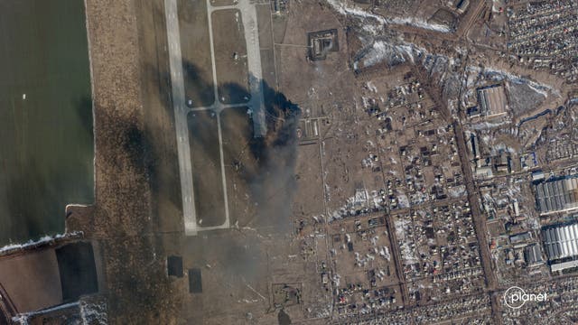 Picture taken with permission from the Twitter feed of @Planet of a satellite image of the Chuhuiv Airbase outside of Kharkiv, Ukraine following Russia’s invasion (Planet Labs PBC/PA)