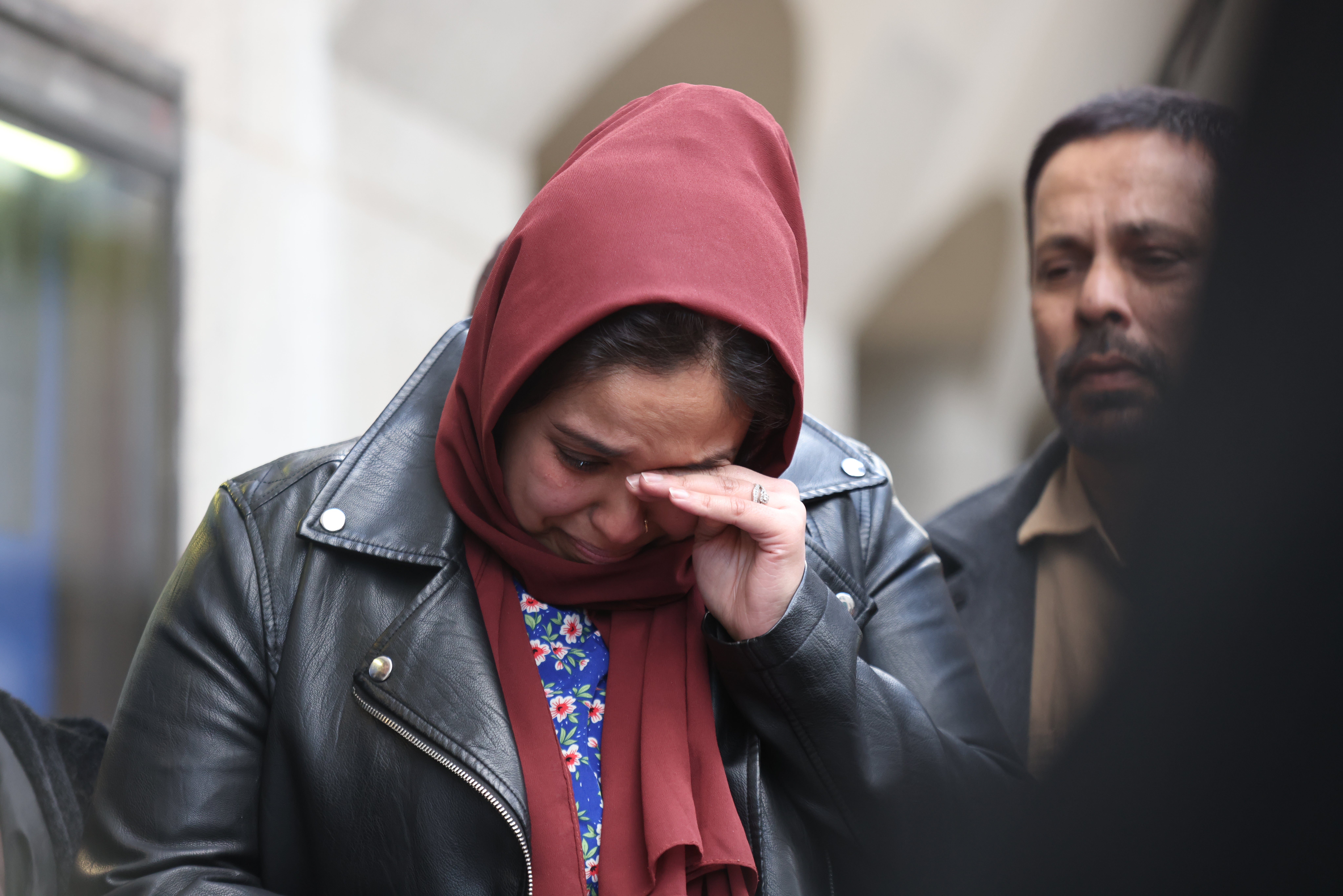 Sabrina Nessa’s sister Jebina Yasmin Islam wipes away a tear whilst speaking outside the Old Bailey (James Manning/PA)