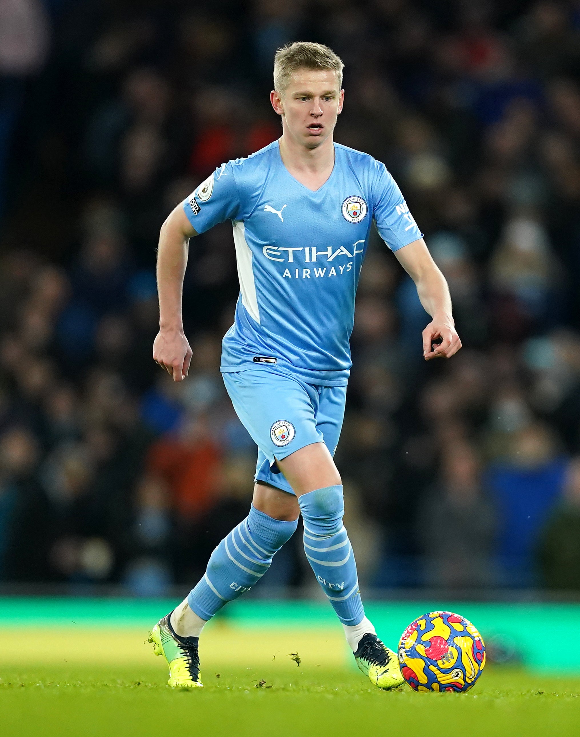 Oleksandr Zinchenko attended a demonstration against Russia’s invasion of his home country in Manchester city centre on Thursday night (Martin Rickett/PA)