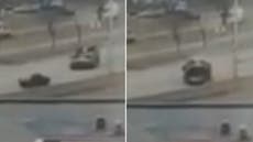 Russian tank swerves to crush civilian car in Kyiv, driver miraculously survives