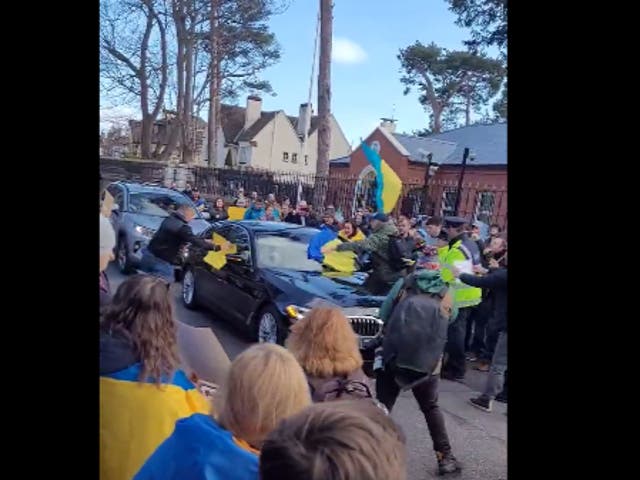 <p>Protesters descend on the Russian ambassador’s car in Dublin</p>