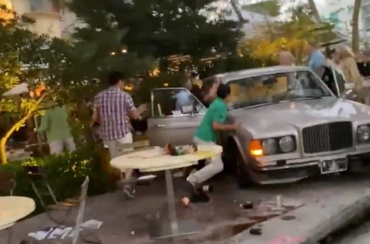 Crowd Lifts Bentley Off Trapped Diners After Miami Restaurant Crash The Independent