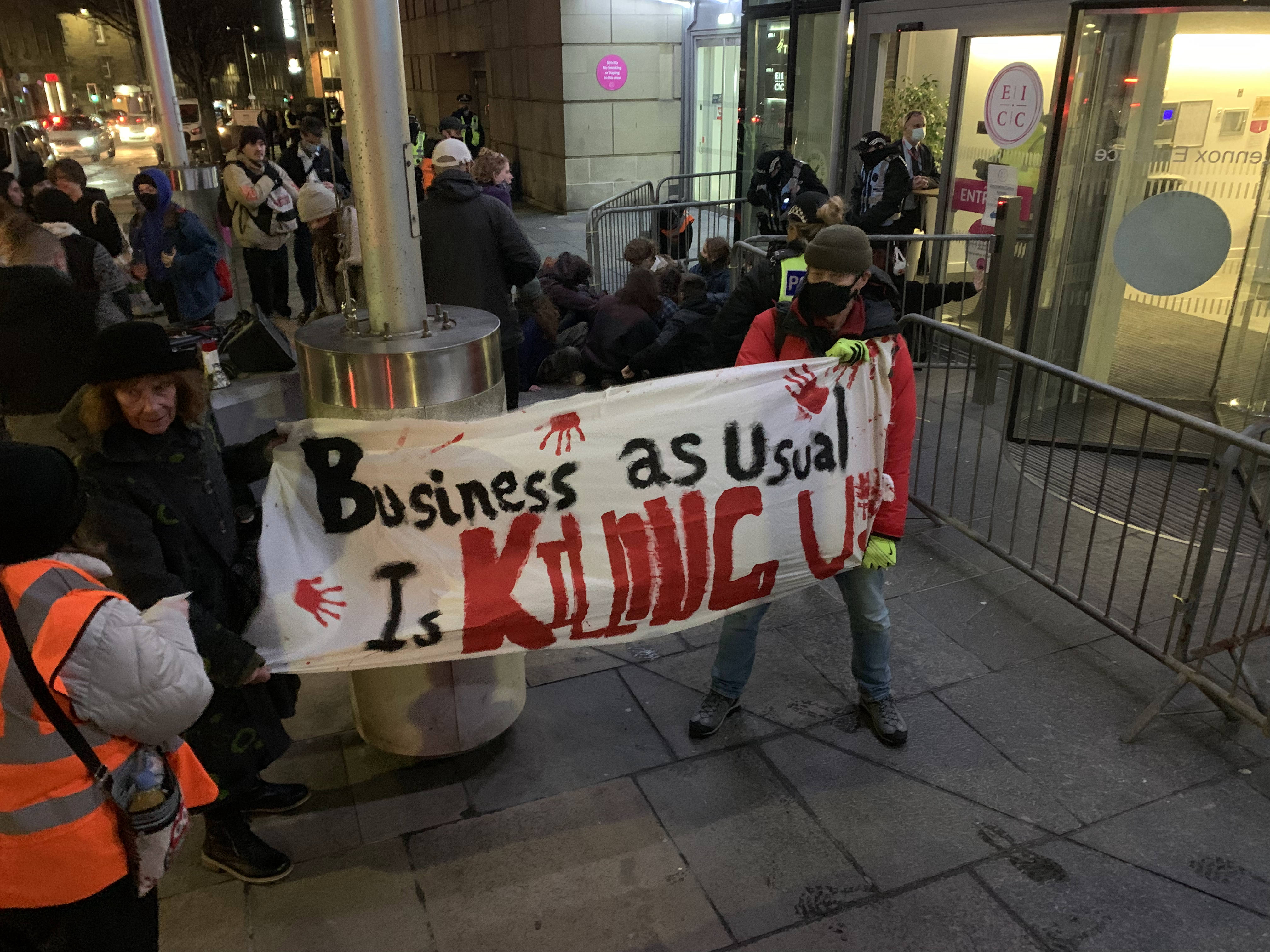 Activists disrupting the Scottish Energy Forum’s black-tie events at the EICC on Friday night (Extinction Rebellion Scotland/PA)