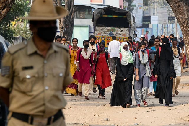<p>Schools in southern India have reopened under tight security, after authorities banned public gatherings following protests over Muslim girls wearing the hijab in classrooms</p>