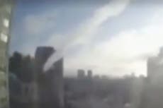 Ukraine-Russia war: CCTV shows moment missile hits tower block in Kyiv