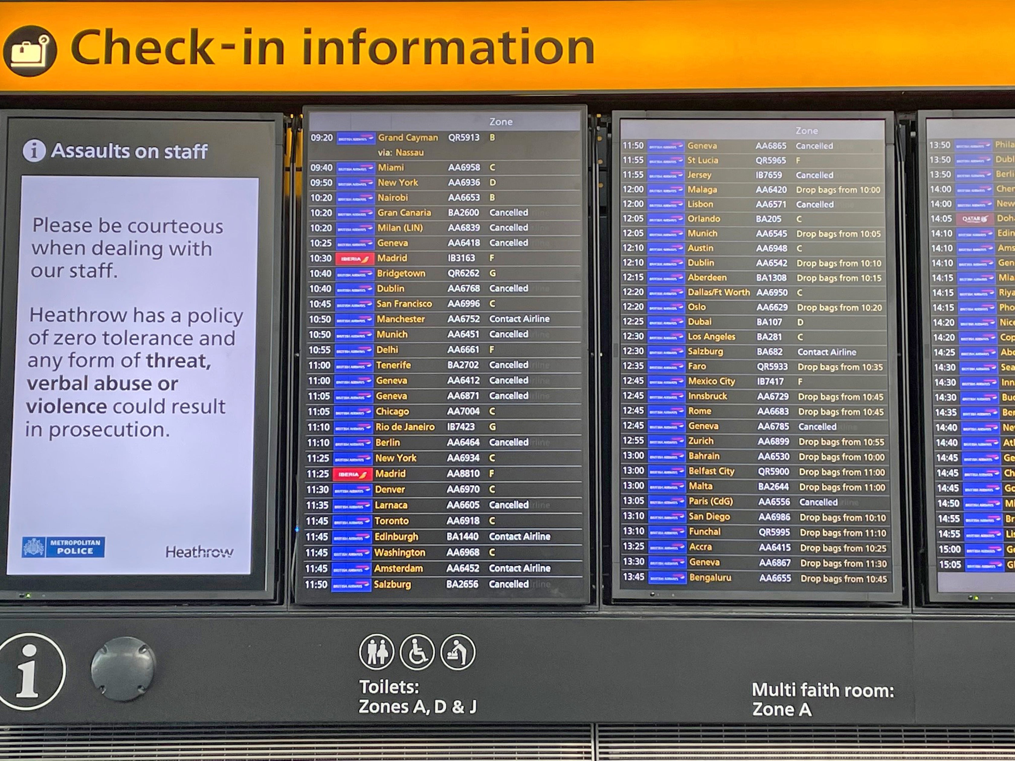 A check-in information board at Heathrow Airport T5 (Jonathan Brady/PA)