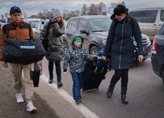 The 40-kilometre queue to flee Ukraine: Thousands of families rush to leave as Russian army advances