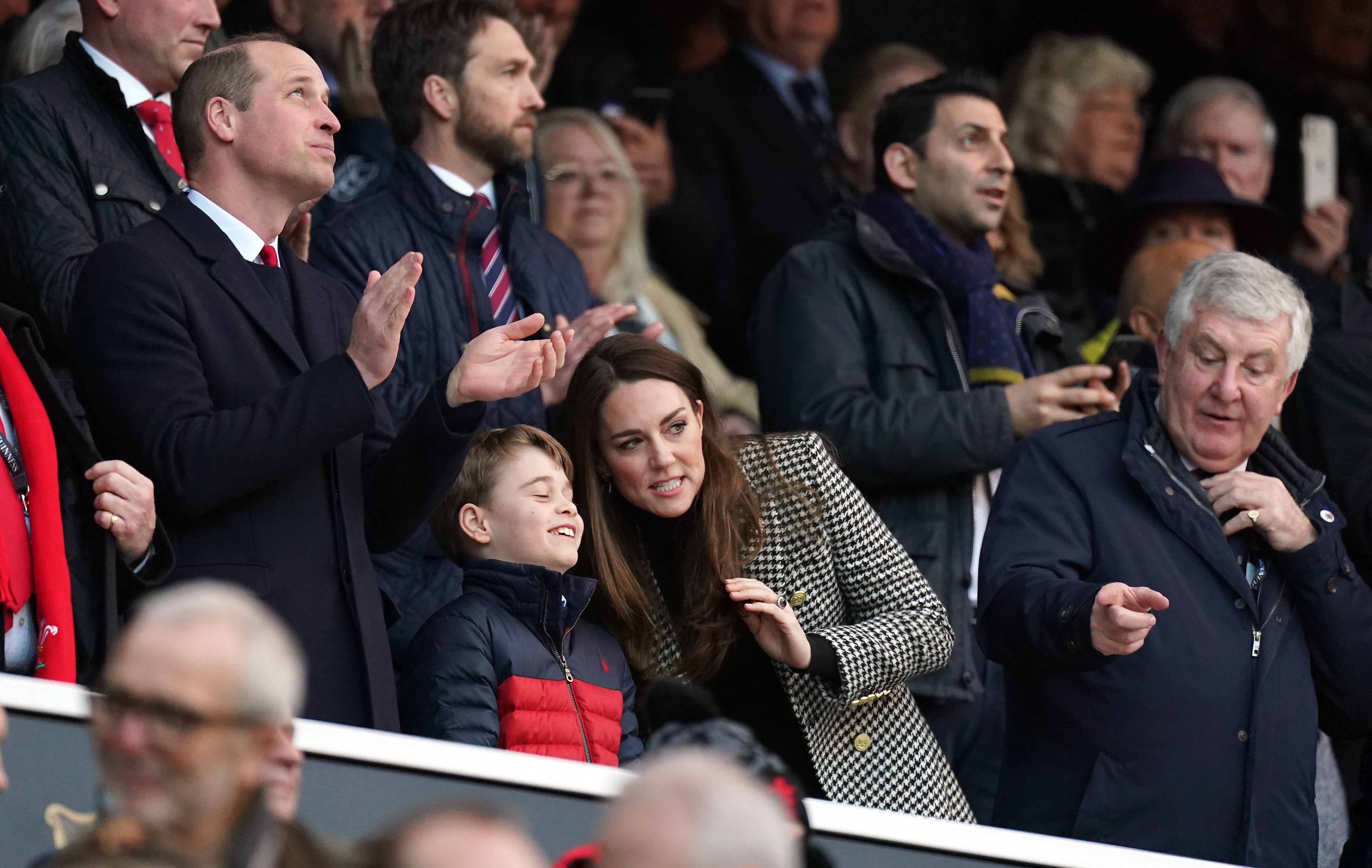The Duke and Duchess of Cambridge and Prince George in the stands (Mike Egerton/PA)