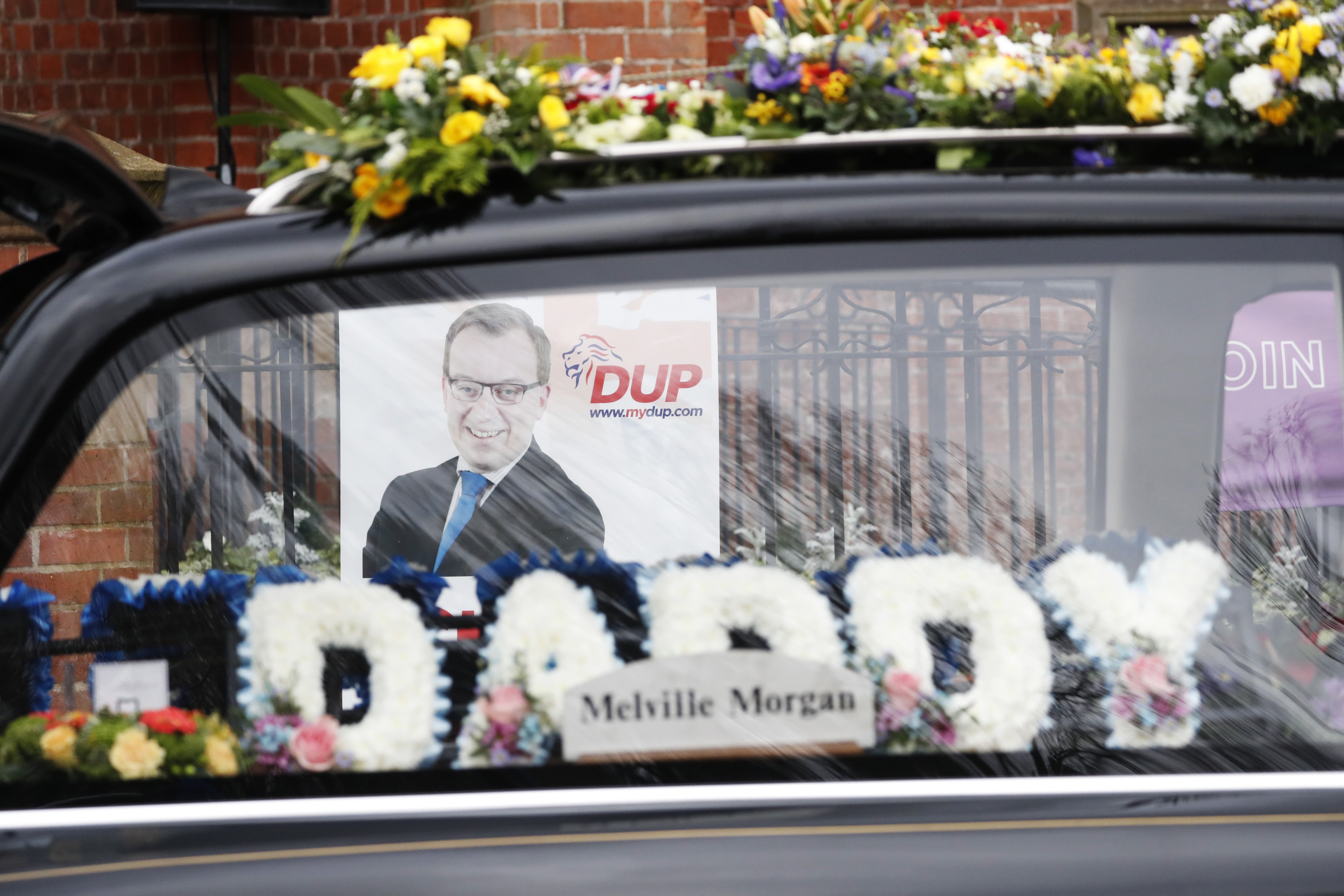The Hearse carrying the coffin of DUP MLA Christopher Stalford (Peter Morrison/PA)