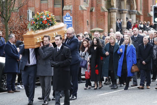 Laura Stalford walks behind the coffin of her husband Christopher Stalford DUP MLA (Peter Morrison/PA)