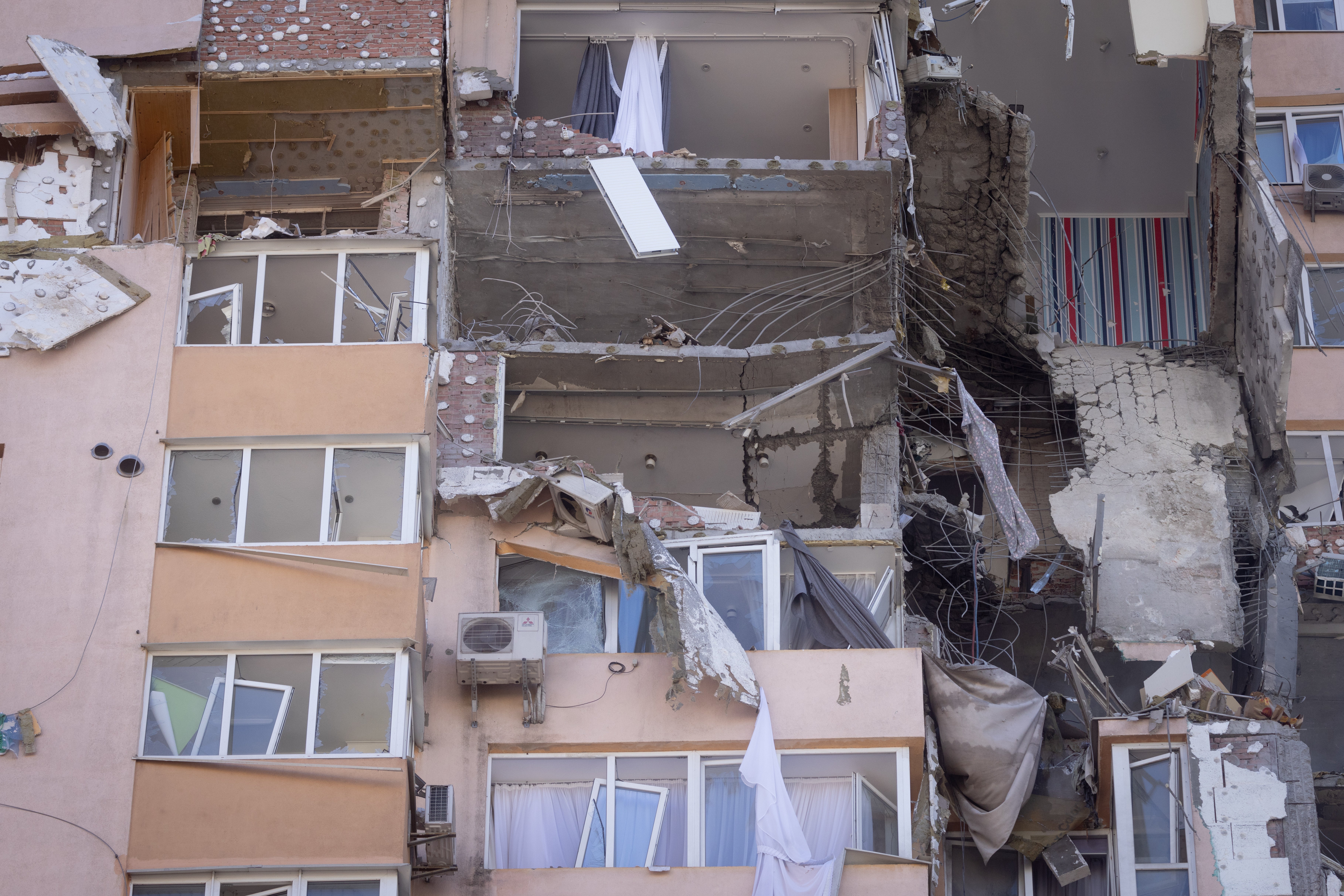 Damage is seen on a large residential tower in Kyiv after it was hit by a missile on 2 February