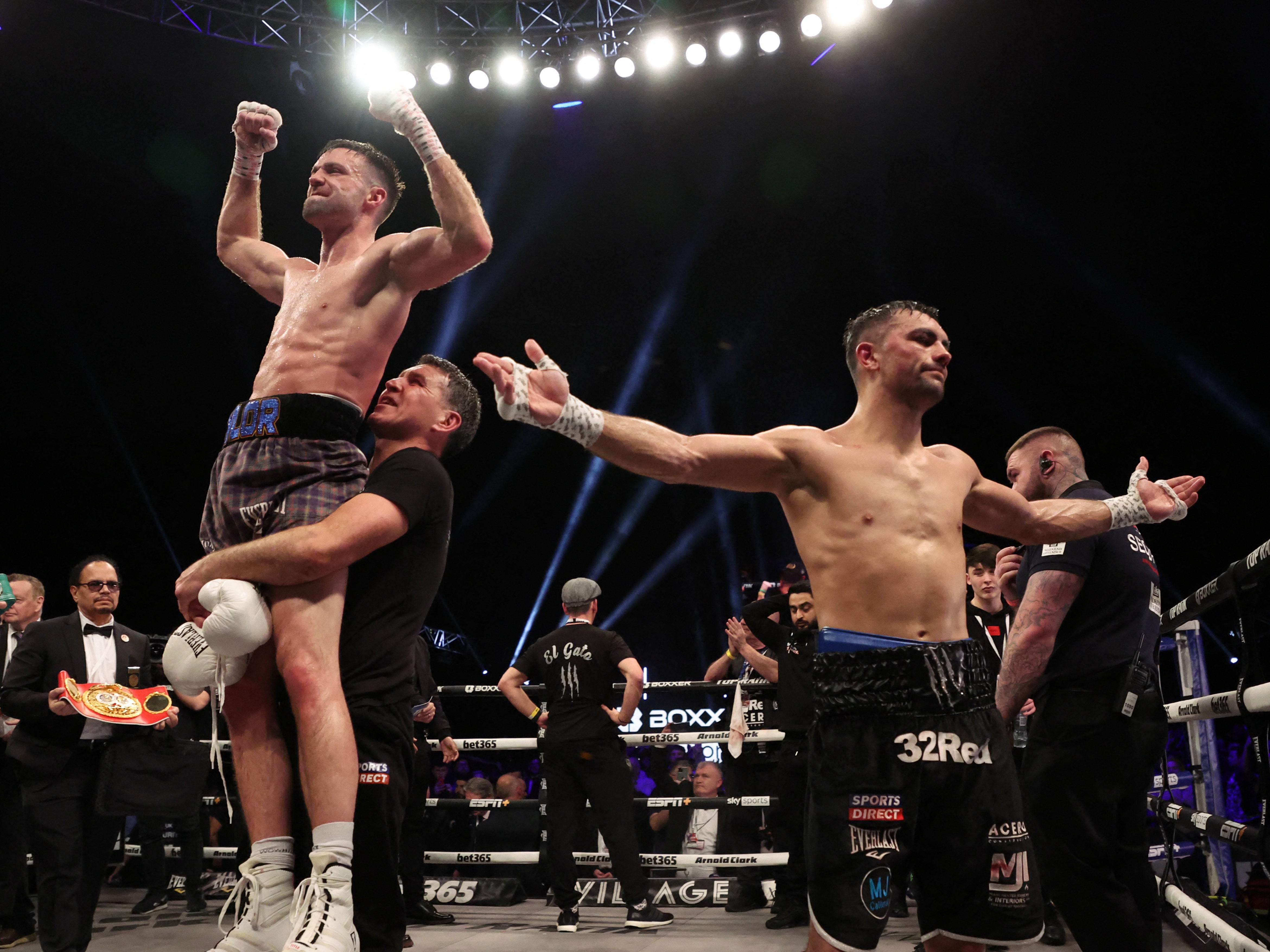 Jack Catterall (right) reacts to his points defeat by Josh Taylor