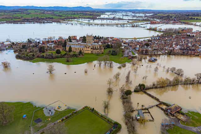 A new report will set out the impacts of climate change, including flooding (Ben Birchall/PA)