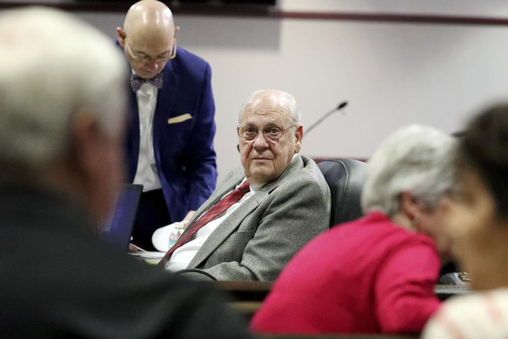<p>Curtis Reeves, center, looks toward his wife, Vivian Reeves, right, while listening to closing arguments during his second-degree murder trial</p>