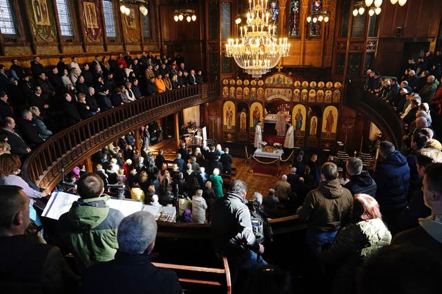 People take part in a special service at the Ukrainian Catholic Eparchy of Holy Family of London (Aaron Chown/PA)