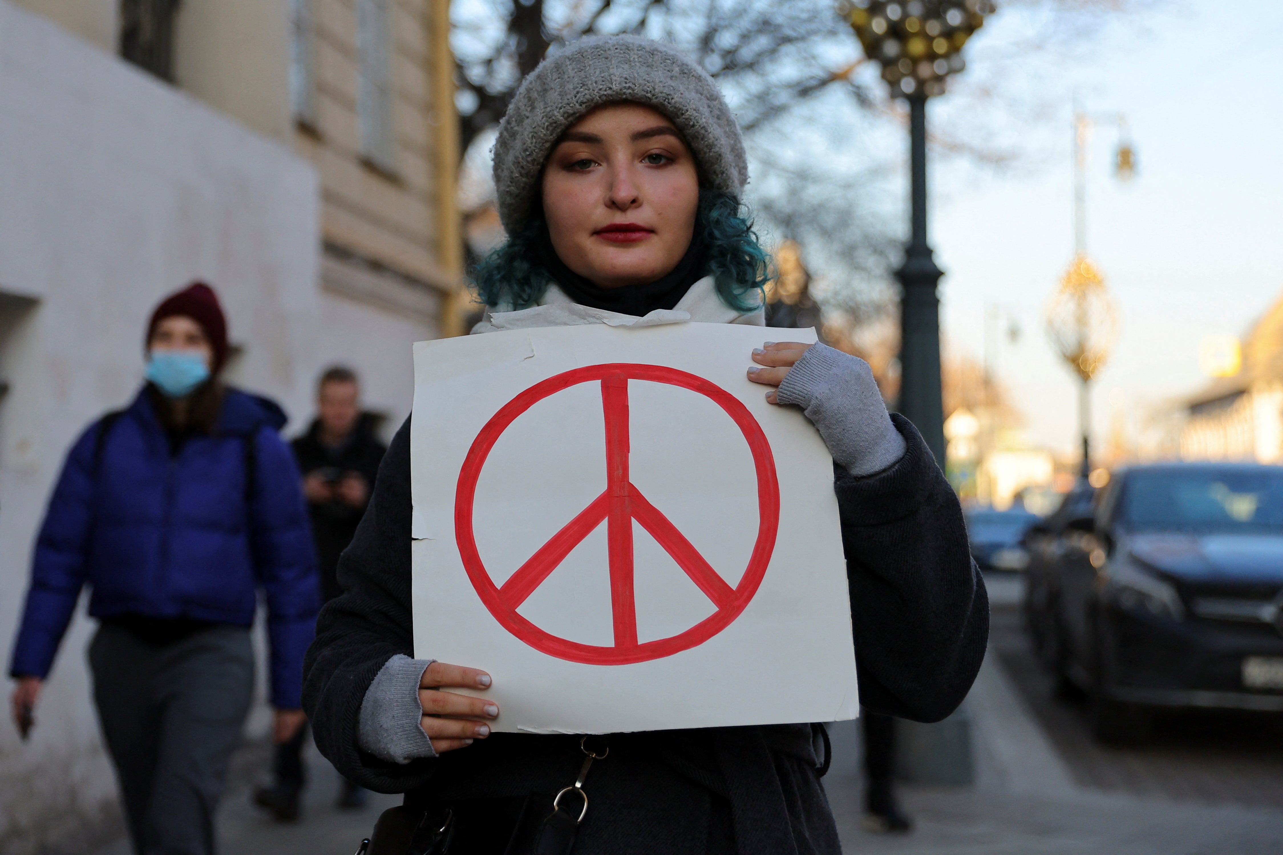 A person holds a sign during a protest against Russian invasion of Ukraine, after President Vladimir Putin authorised a massive military operation, in Moscow, Russia February 27, 2022