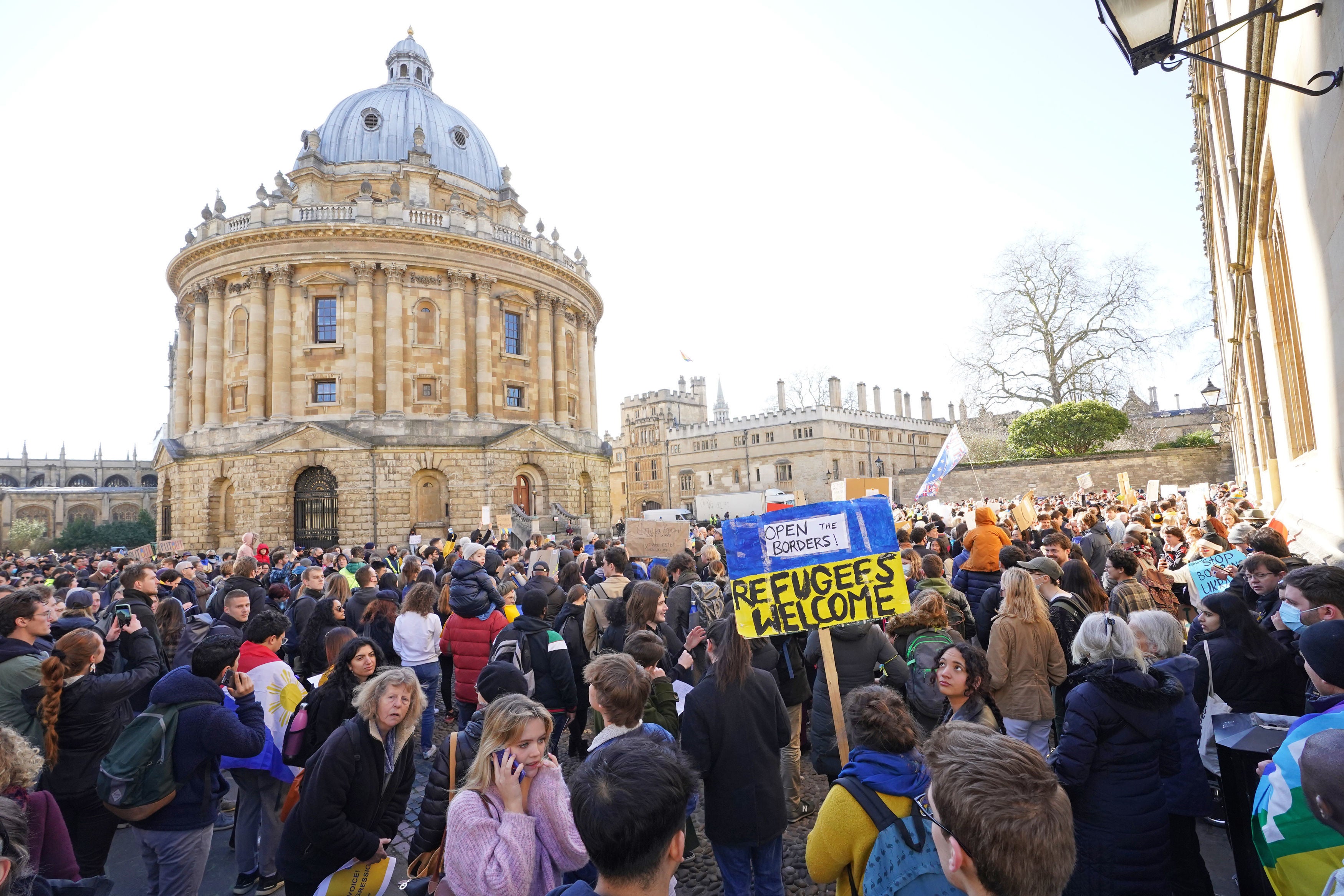 People take part in a demonstration outside the the Radcliffe Camera in Oxford, to denounce the Russian invasion of Ukraine