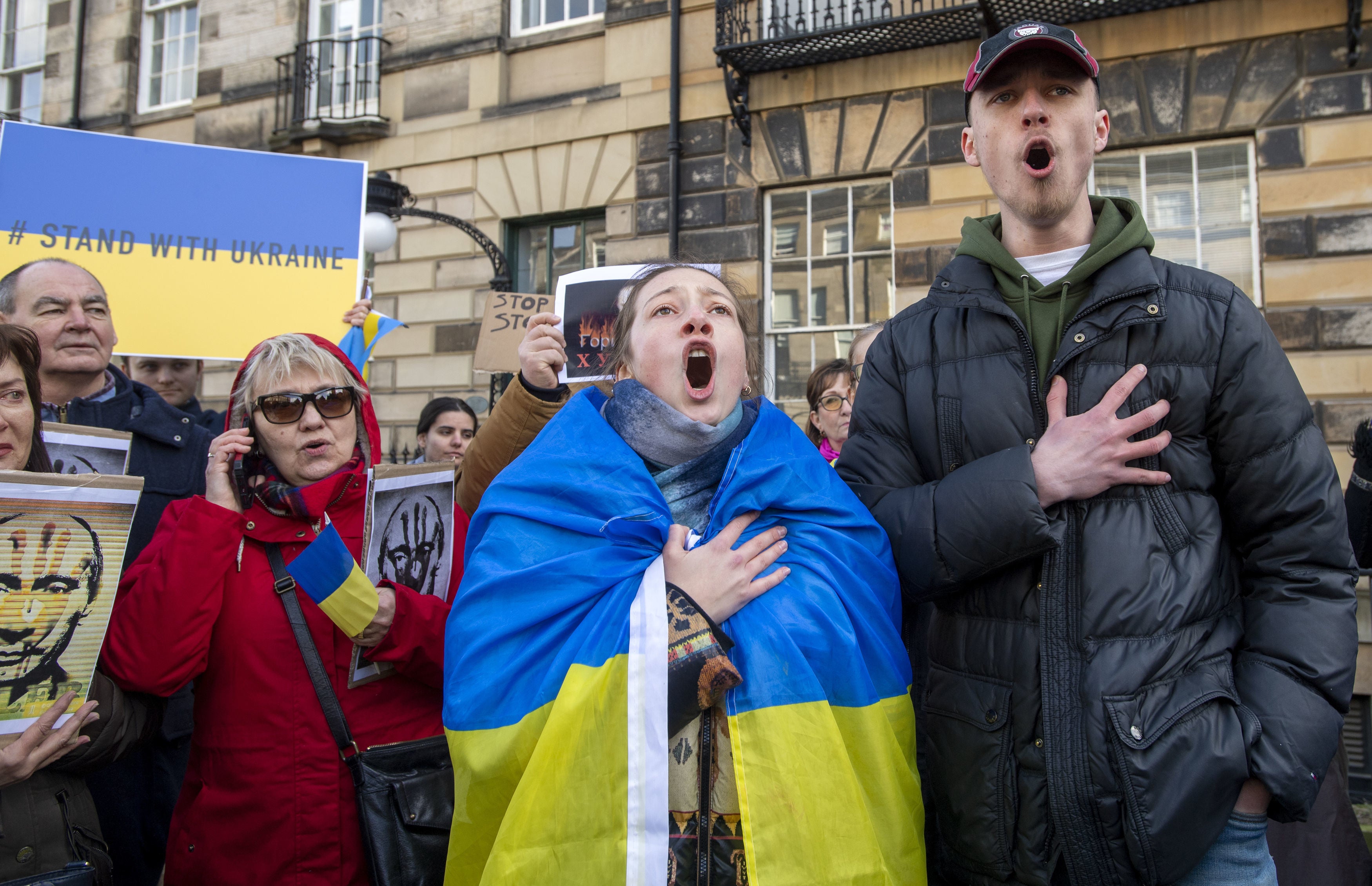 People take part in a demonstration outside the Russian consulate general in Edinburgh, following the Russian invasion of Ukraine (Lesley Martin/PA)