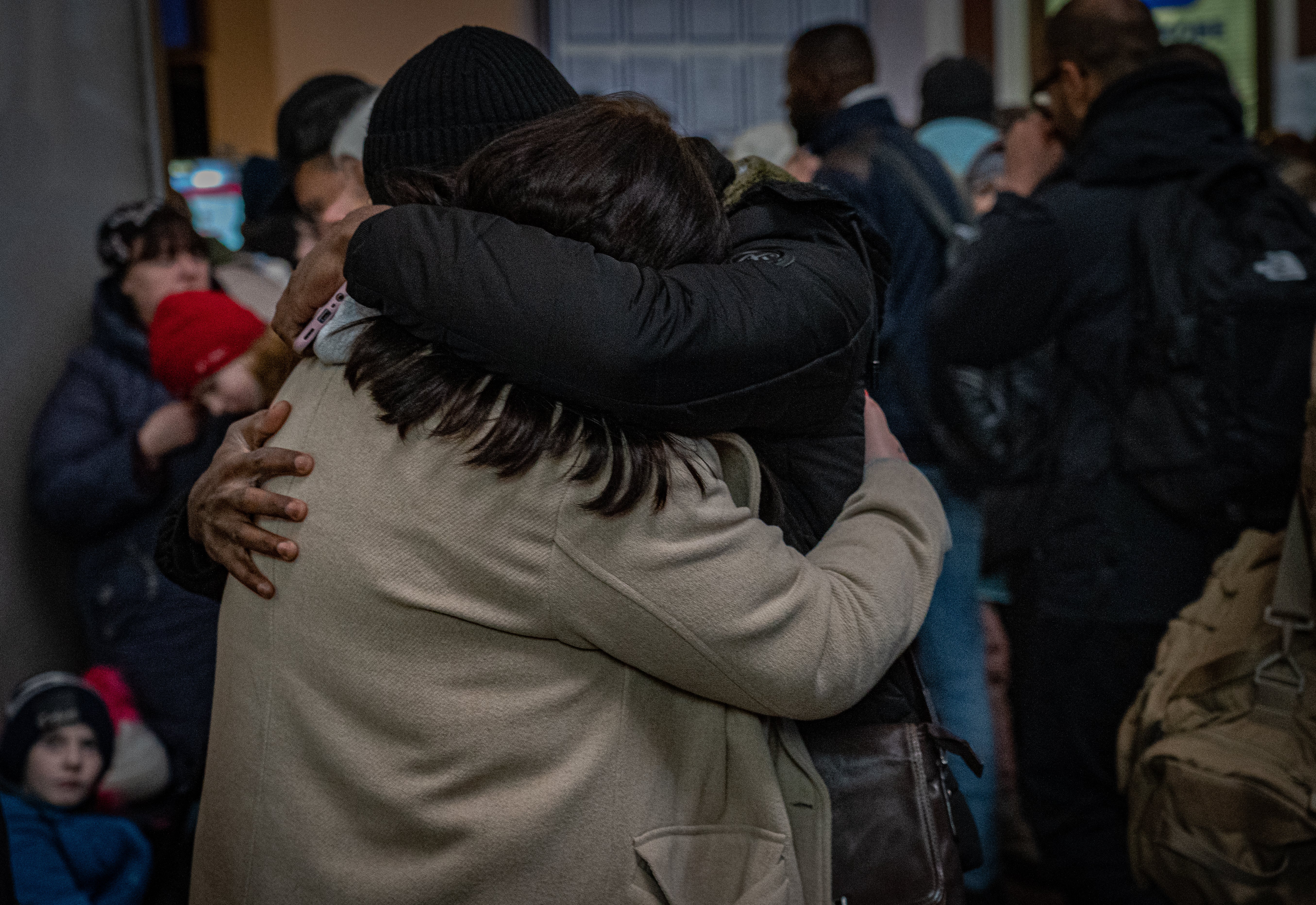 An emotional couple reunite at Lviv station after fleeing war