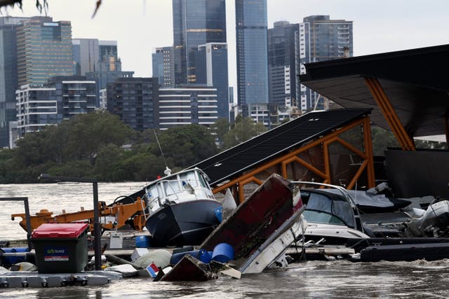 <p>Boats and other debris are seen washed into the Milton ferry terminal on the Brisbane river in Australia’s Brisbane city on 28 February 2022 </p>