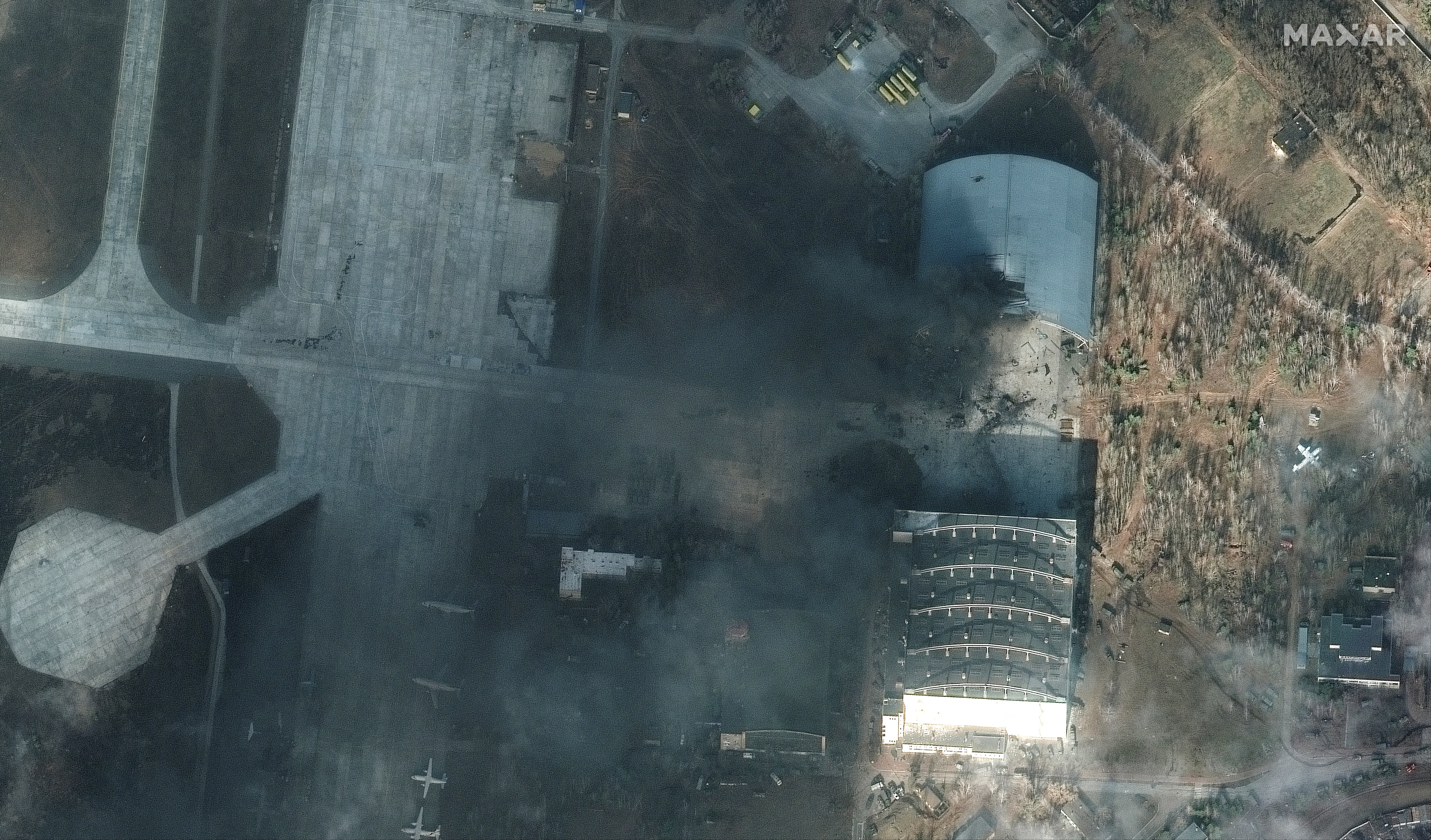 A satellite image by Maxar Technologies shows a damaged hangar at Antonov Airport in Hostomel