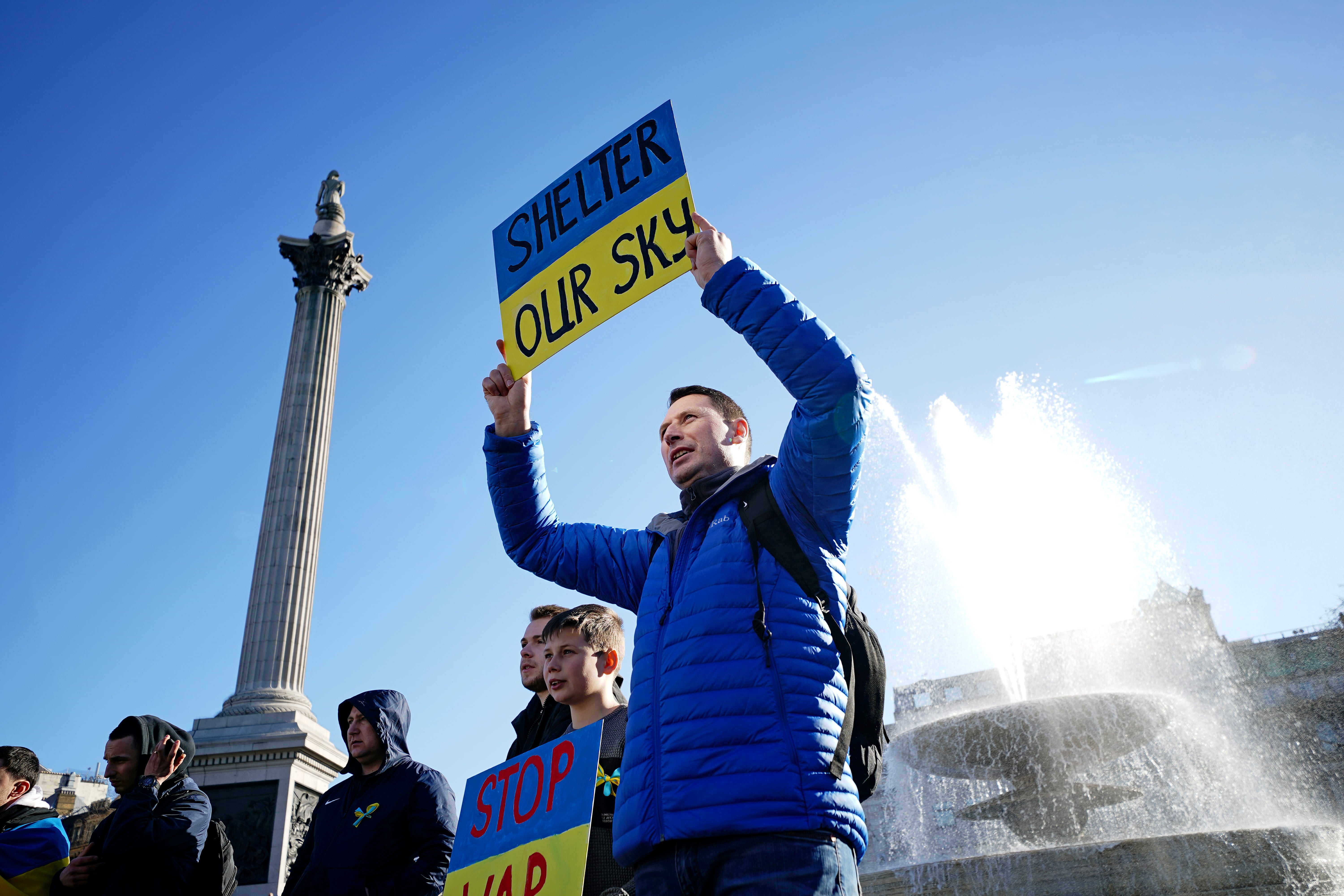 People take part in a demonstration in Trafalgar Square, London, to denounce the Russian invasion of Ukraine (Aaron Chown/PA)