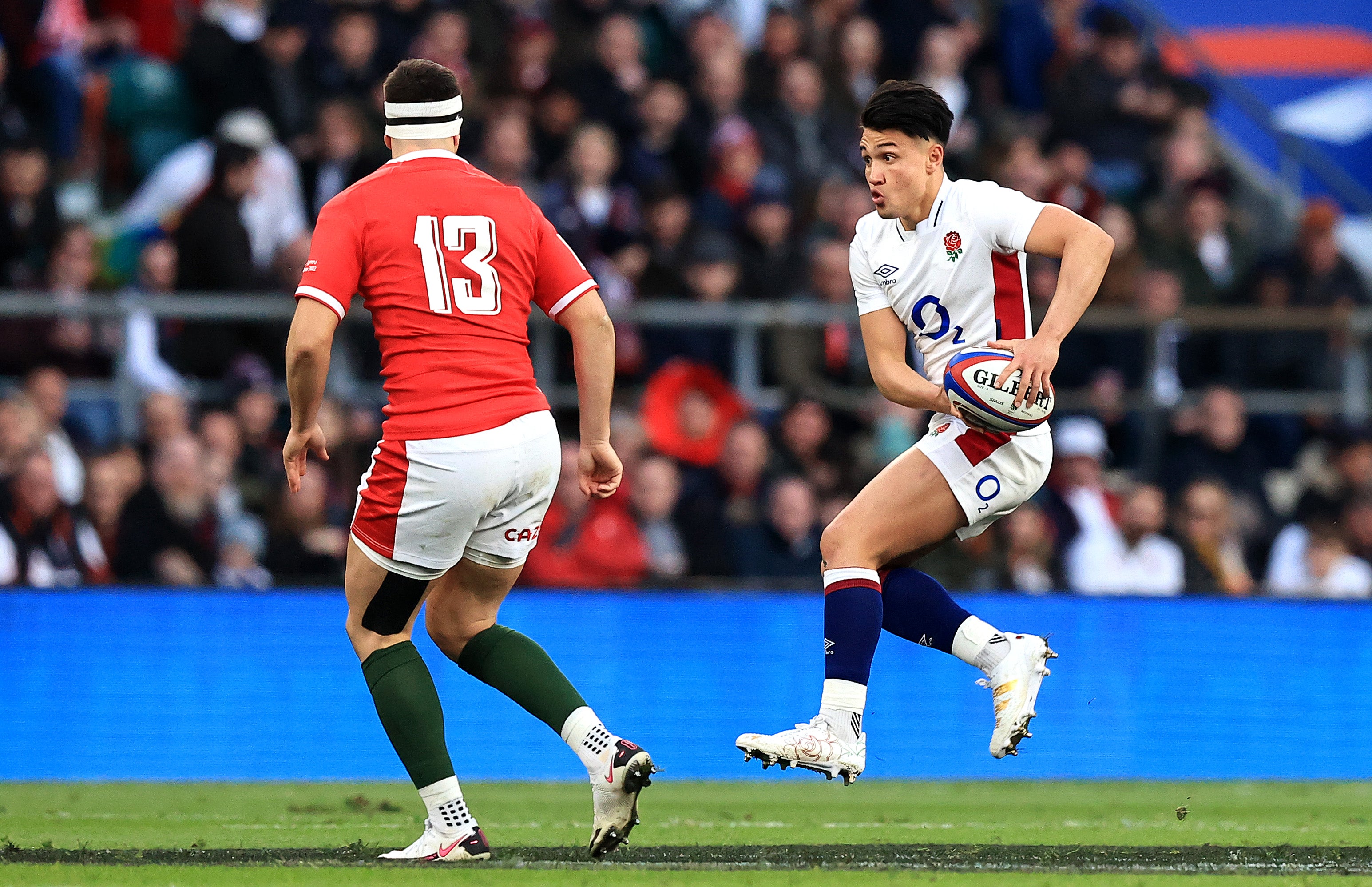 Marcus Smith takes on the Welsh defence with ball in hand