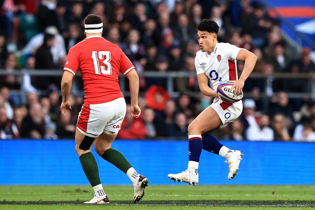 <p>Marcus Smith takes on the Welsh defence with ball in hand</p>