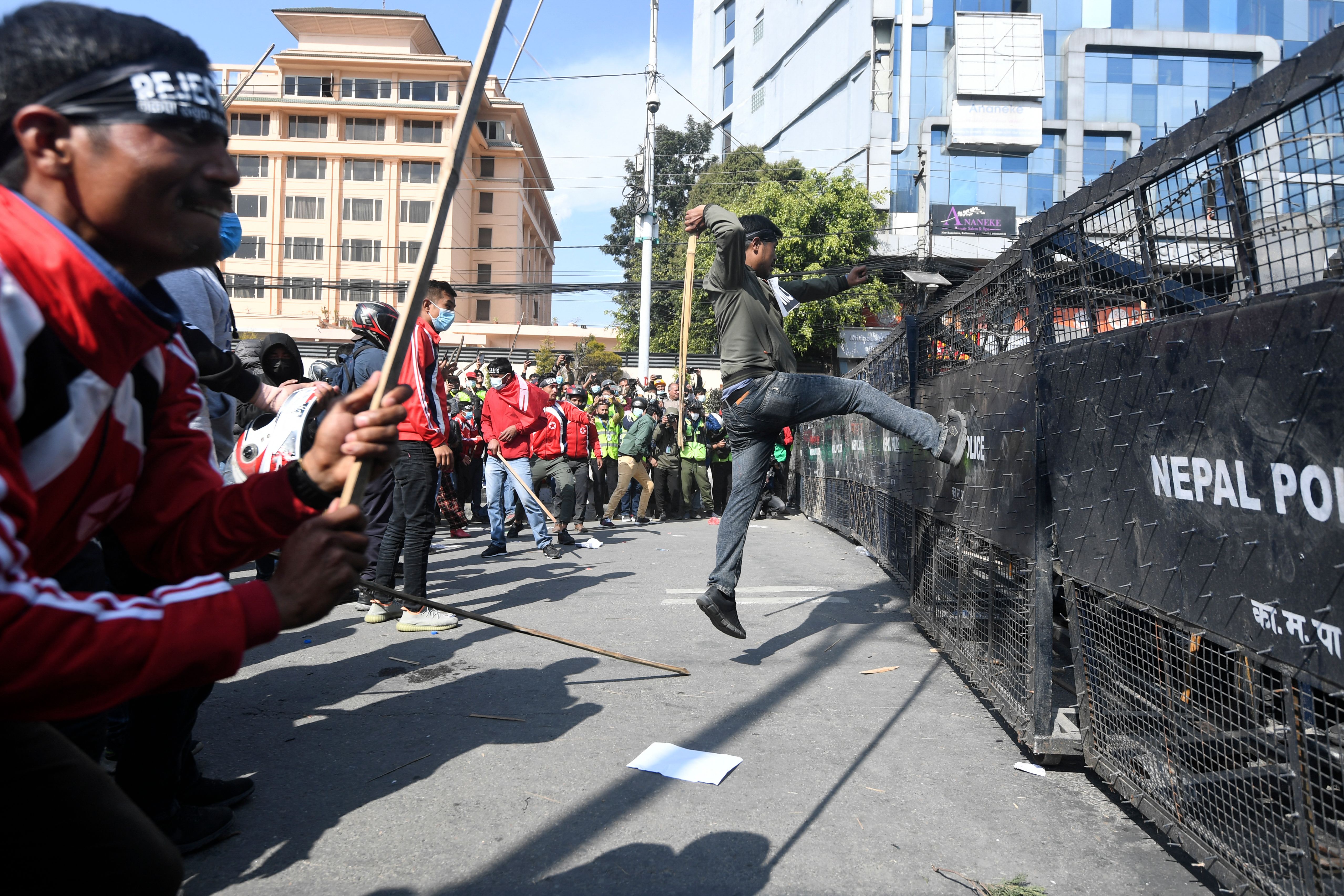 Demonstrators clash with police during a protest against the proposed grant agreement from America under the Millennium Challenge Corporation (MCC), in Kathmandu on 27 February 2022