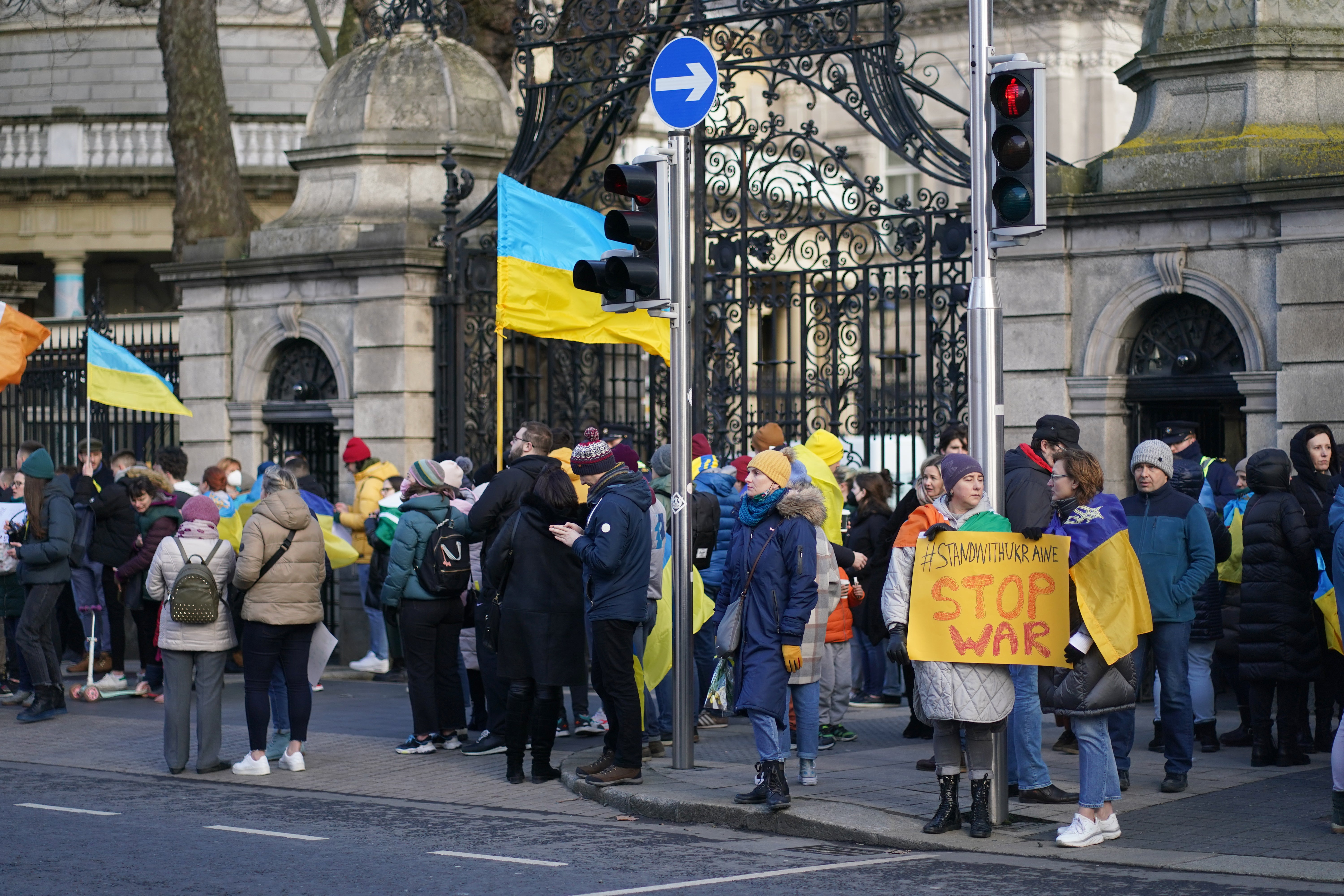 Demonstrators outside Leinster House in Dublin (Brian Lawless/PA)