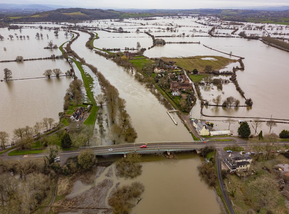 The number of people hit by heavy rain and river flooding and the costs of resulting damage could double if temperatures climb to 3C above pre-industrial levels, a report warns (Ben Birchall/PA)