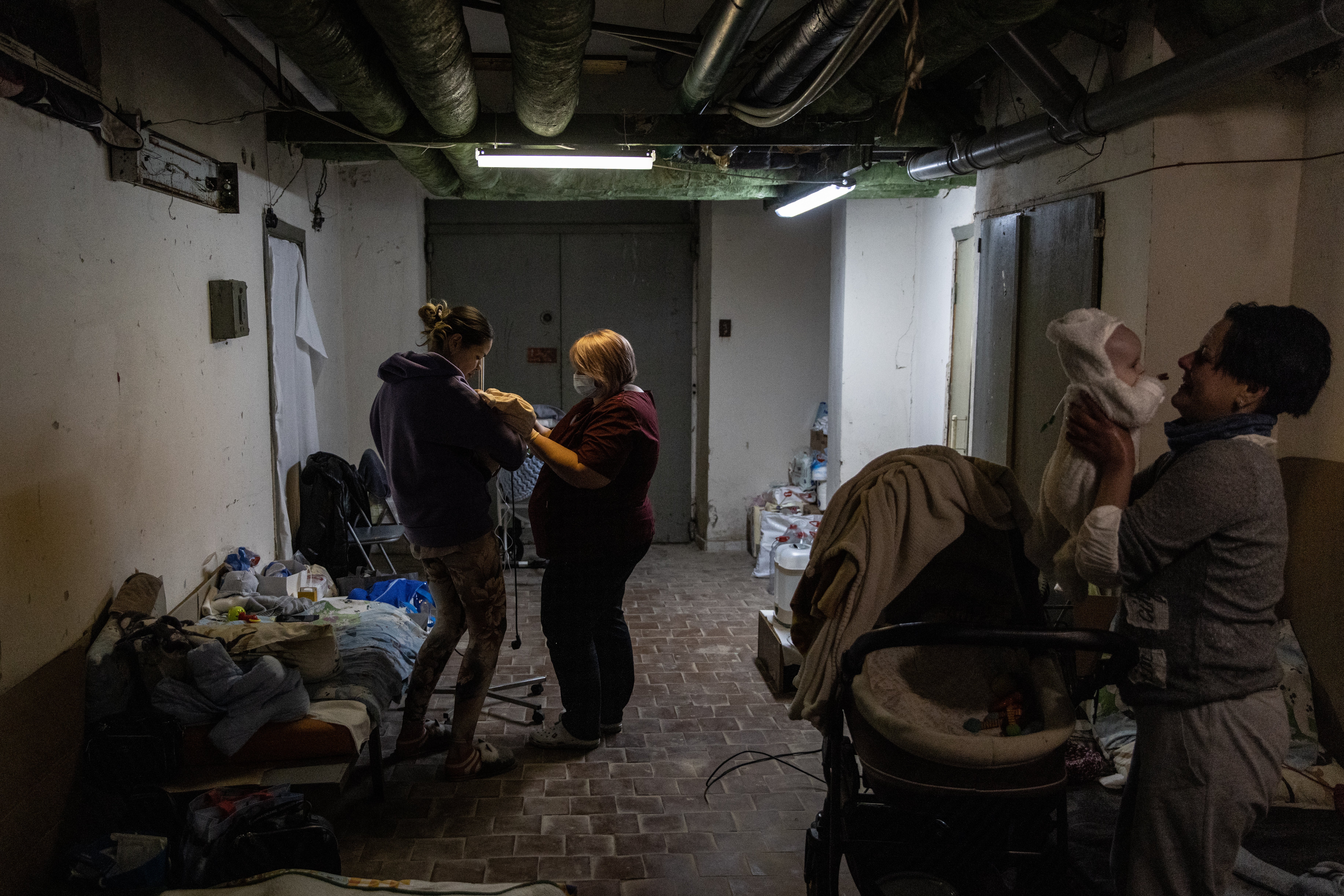 Babies are moved to bomb shelter by hospital in Kyiv