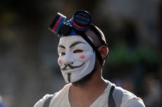 Anonymous news - live: Hacking attacks launched across Europe as internet activist group trolls Putin