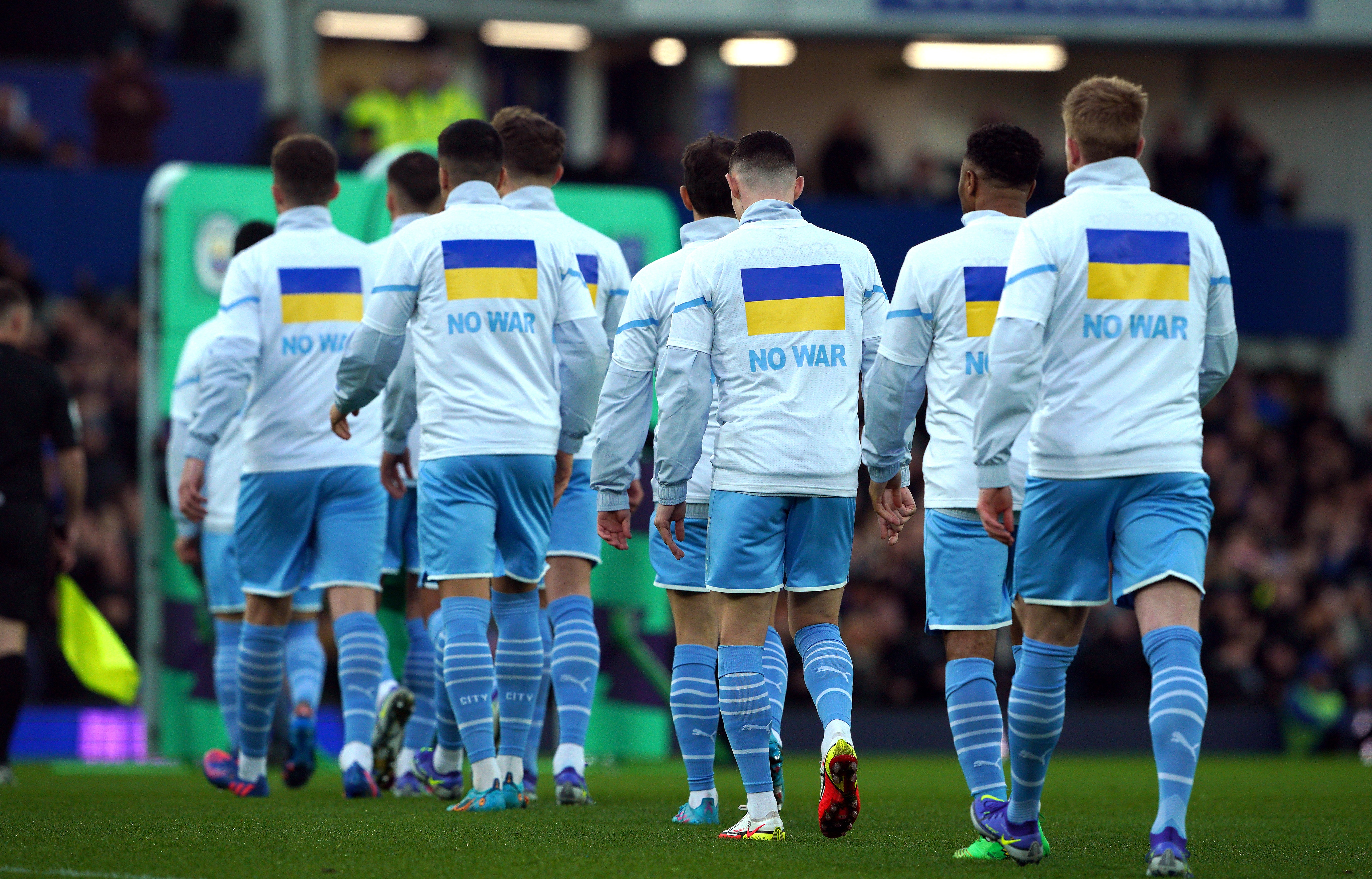 Manchester City players took to the field against Everton with shirts bearing the Ukrainian flag and the message ‘No War’ (Peter Byrne/PA).