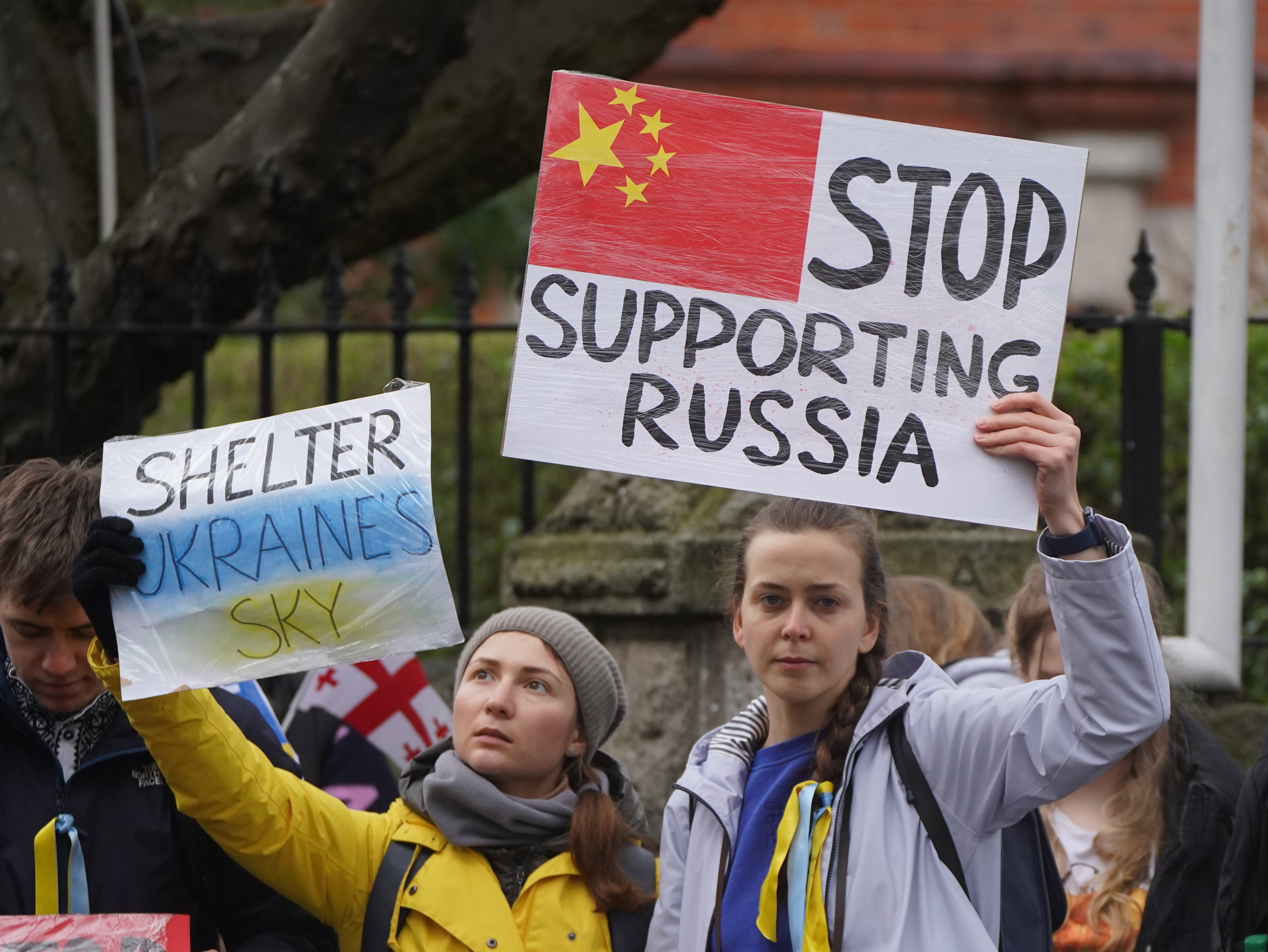 People protesting outside the Chinese Embassy in Dublin over the Russian invasion of Ukraine (Niall Carson/PA)
