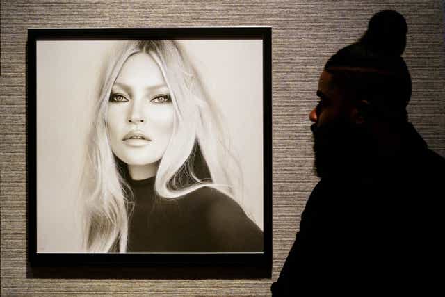 Portrait of Kate Moss and pop-art Bentley among British memorabilia up for sale (Victoria Jones/PA)