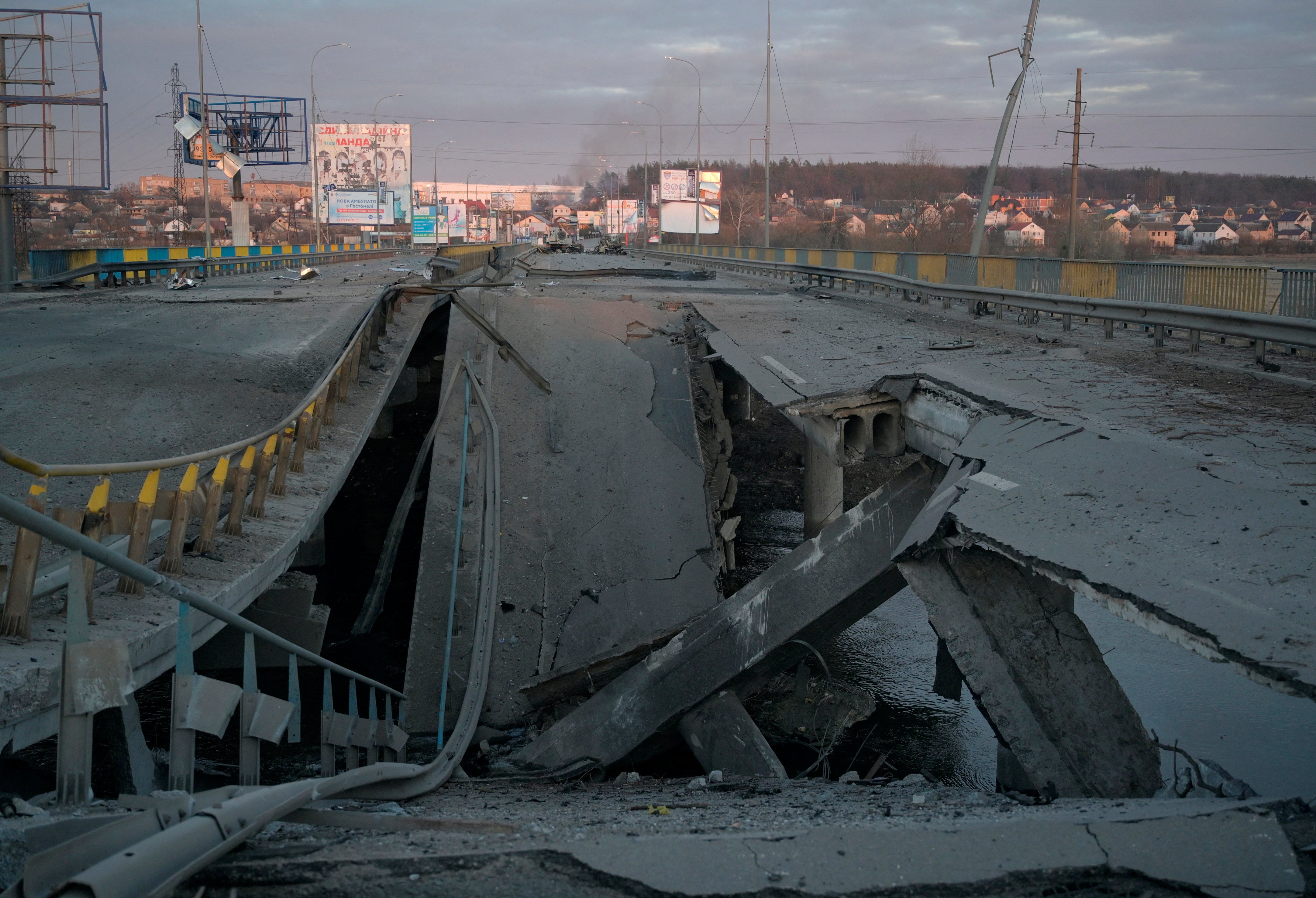 <p>A destroyed bridge can be seen near the town of Bucha</p>