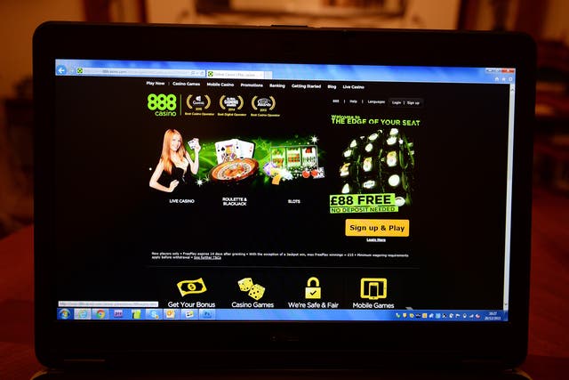 A person accesses the 888casino.com gambling website on a laptop computer (PA)