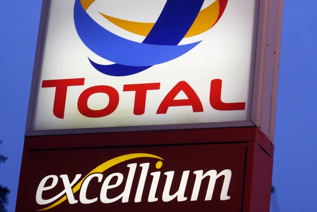 French oil giant Total said it will not invest in any new projects in Russia (Steve Parsons/PA)
